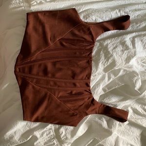 This item is from SHEIN and it is a size large also its like a chocolate brown